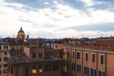 view of St Peters Basilica in evening in Rome, Italy clipart