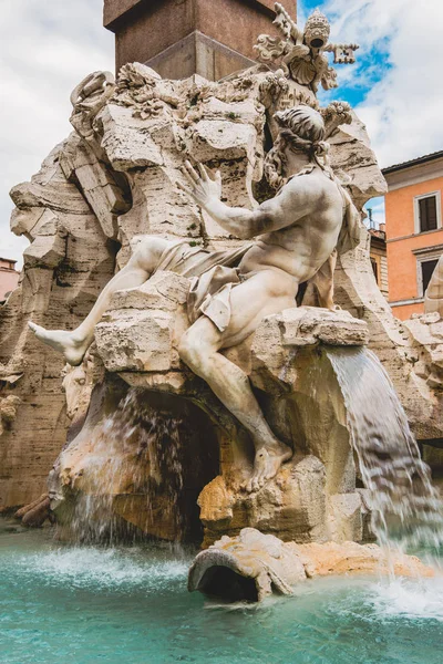 Statues on ancient Fountain of Four Rivers in Rome, Italy — Stock Photo