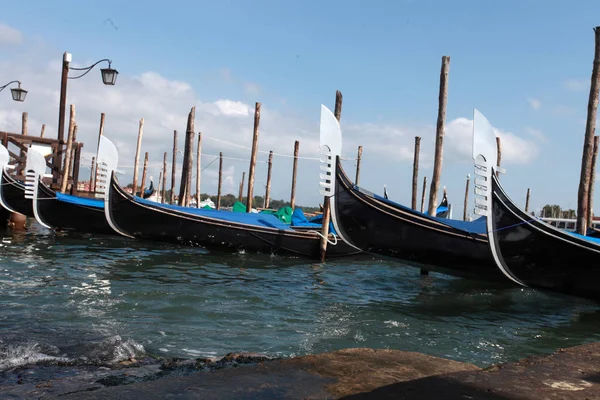 Venice gondolas dotted in San Marco c — стоковое фото