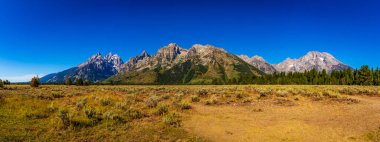 Teton Range viewed from Cathedral Group Turnout, in Grand Teton National Park clipart