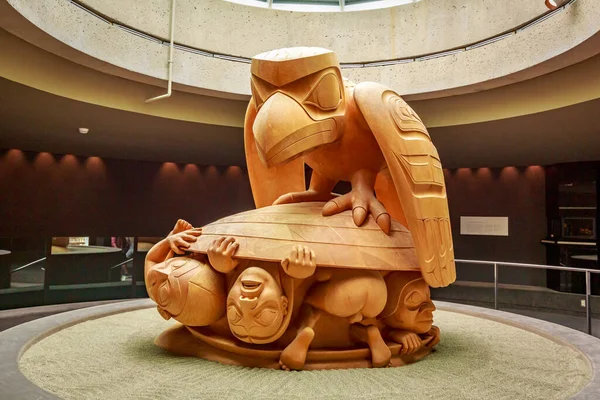The yellow cedar sculpture The Raven and the First Men by Bill Reid, in Museum of Anthropology at University of British Columbia