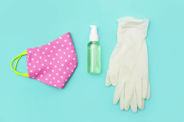 diy fabric face masks. medical gloves and sanitizer in bottle