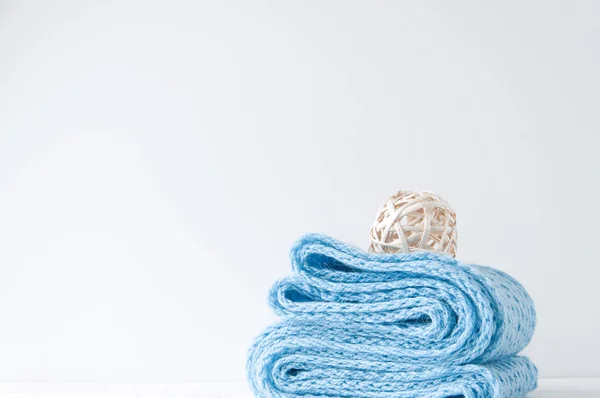 Minimal elegant composition with blue scarf and rattan ball — Stock Photo, Image
