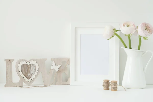 White frame mockup with pink ranunculos — Stock Photo, Image