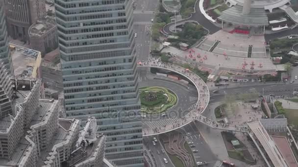 China, Shanghai. Top view from Shanghai World Financial Center. People on the pedestrian crossing. — Stock Video