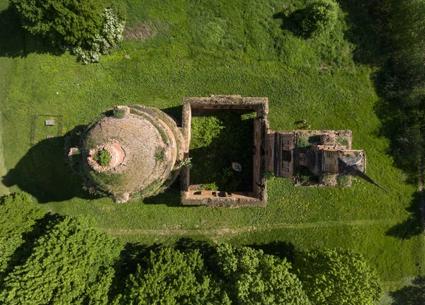 Old ruined church and bell tower, Russia. Aerial