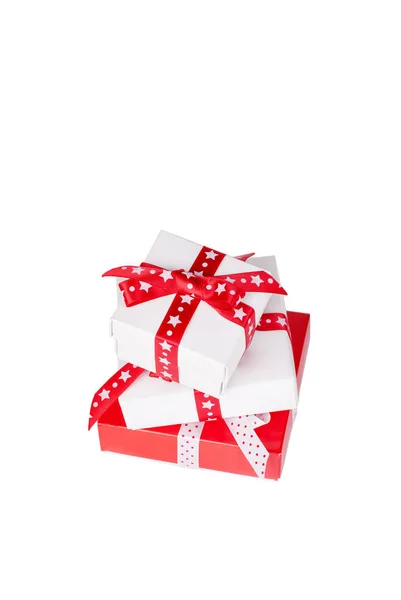 Three present boxes with ribbons isolated on white — Stock Photo, Image