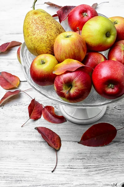 High vase with apples — Stock Photo, Image
