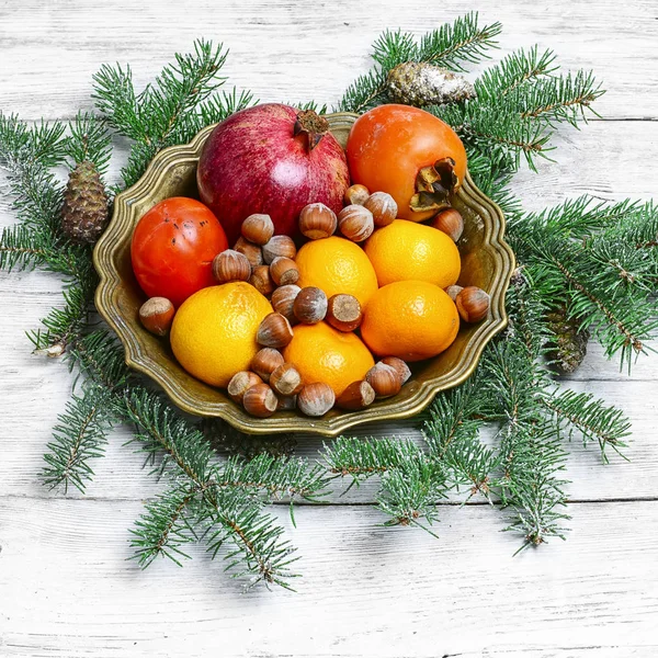 Christmas still life with citrus — Stock Photo, Image