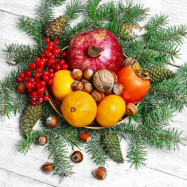 Christmas still life with citrus — Stock Photo, Image