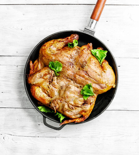 Roast chicken tobacco on pan