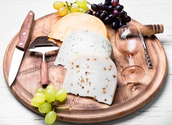 Different kinds of swiss cheeses — Stock Photo, Image