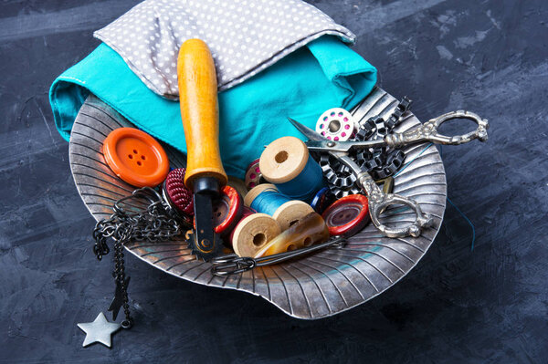 Buttons, scissors and thread