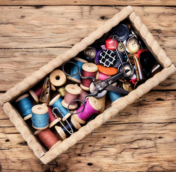 Thread spools and buttons — Stock Photo, Image