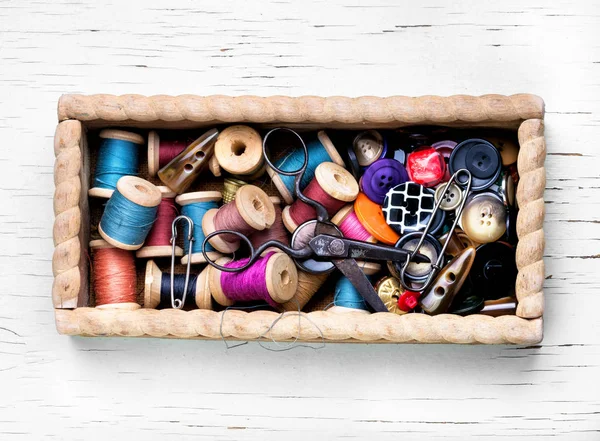 Thread spools and buttons — Stock Photo, Image