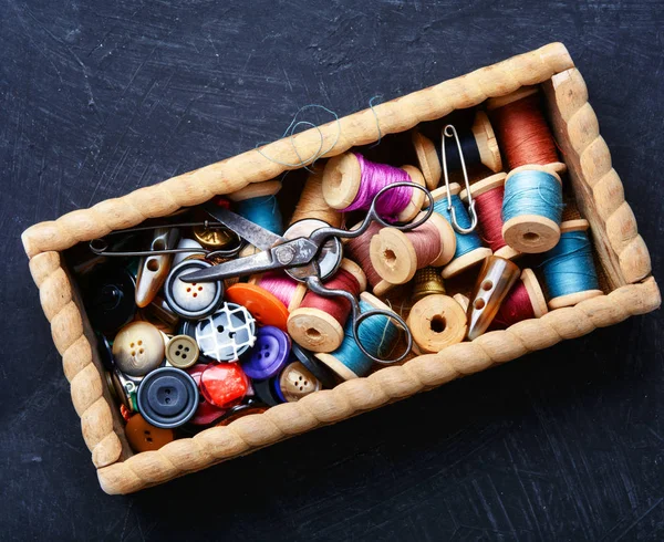 Thread spools and buttons — Stock Photo, Image