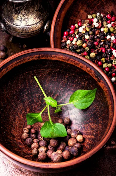 Different kinds of peppercorns. — Stock Photo, Image