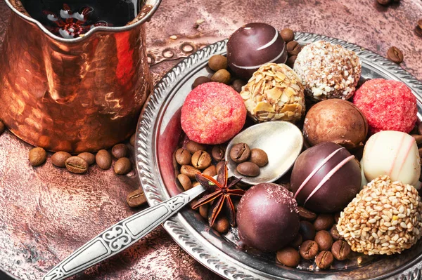 Chocolate sweets and coffee — Stock Photo, Image