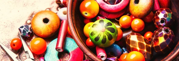 Making bijouterie of colored beads