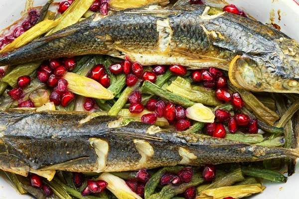 Baked fish with pomegranate — Stock Photo, Image