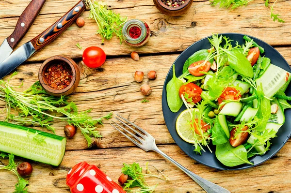 Fresh Salad Cucumbers Tomatoes Herbs Lemon Hazelnuts — Stock Photo, Image