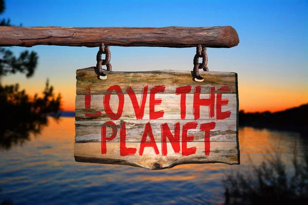 Love the planet motivational phrase sign — Stock Photo, Image