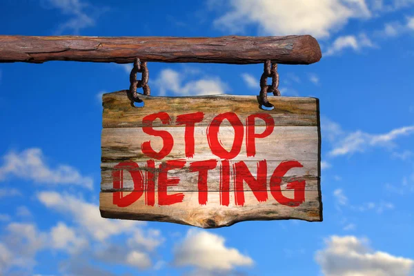 Stop dieting motivational phrase sign