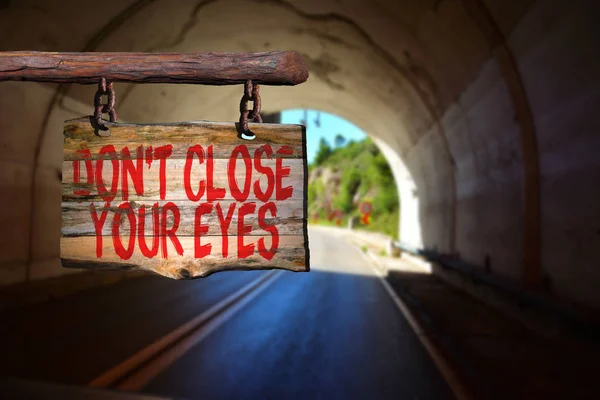 Don 't close your eyes motivational phrase sign — стоковое фото