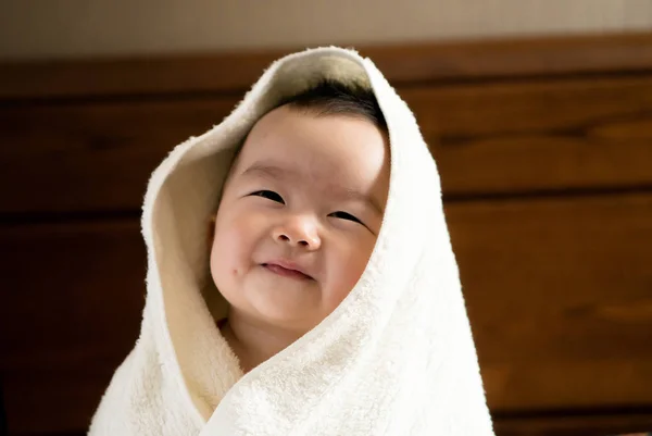 Baby with towel — Stock Photo, Image