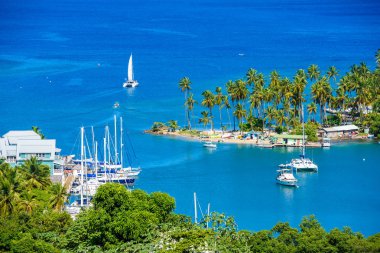 Close view of cruise yachts in Marigot Bay, Saint Lucia, Caribbean. clipart