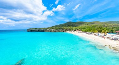 Grote Knip beach with white sand and turquoise water, Curacao, Netherlands Antilles. clipart