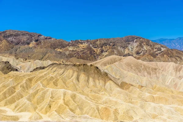 Zabriskie Point - view to colorful ridges and sand formation at Death Valley National Park, California, USA.