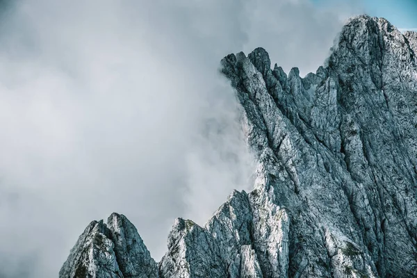 Mountains in clouds at Ellmauer Halt, Wilder Kaiser mountains of Austria - close to Gruttenhuette, Going, Tyrol, Austria - Hiking in the Alps of Europe