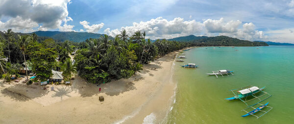 Aerial view of Port Barton Beach on paradise island, tropical travel destination - Port Barton, San Vicente, Palawan, Philippines.