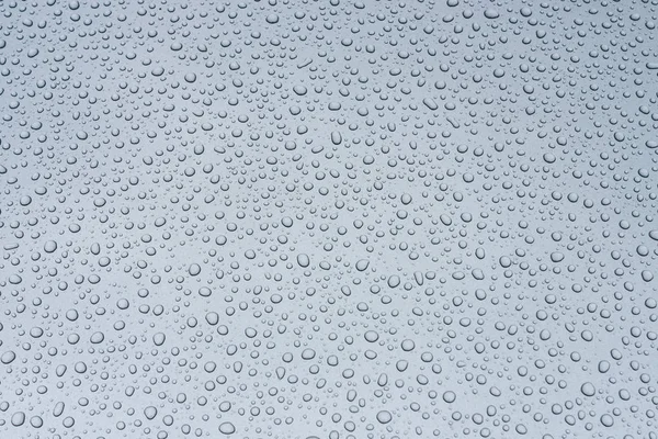 Gray shiny surface in drops of water. Background. — Stock Photo, Image