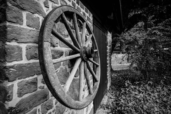 Wooden Wheel Cart Hangs Brick Wall Black White — Stock Photo, Image