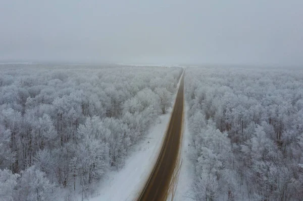 winter mountain road aerial view