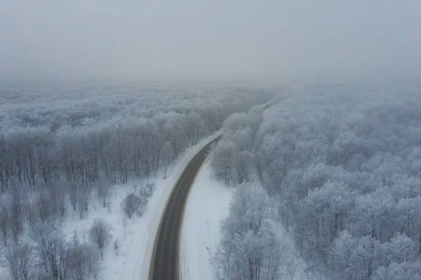 winter mountain road aerial view