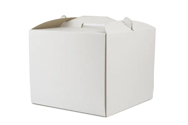 Большая картонная коробка с ручкой для ношения торта — стоковое фото