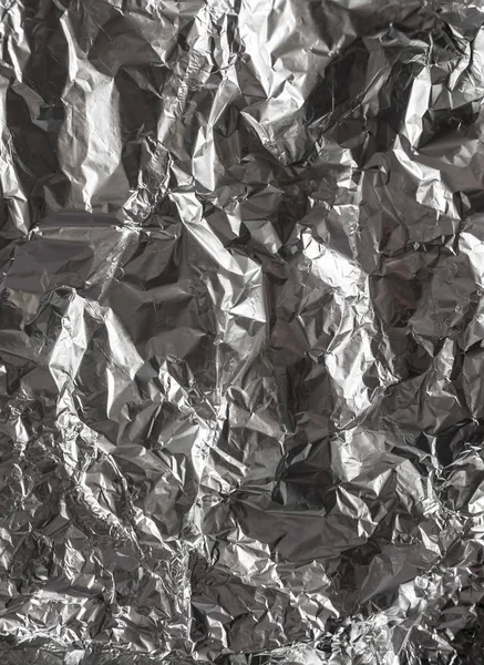 Foil background with reflection of light. — Stock Photo, Image