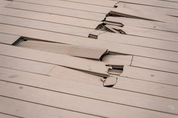 Broken boards on pier. — Stock Photo, Image