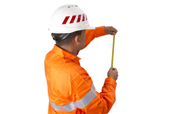 Supervisor com fita métrica vestindo camisa de alta visibilidade em um — Fotografia de Stock