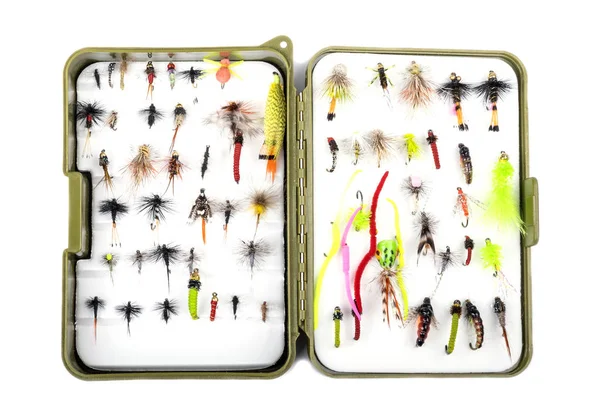Caja de pesca llena de pequeñas moscas atadas a mano — Foto de Stock