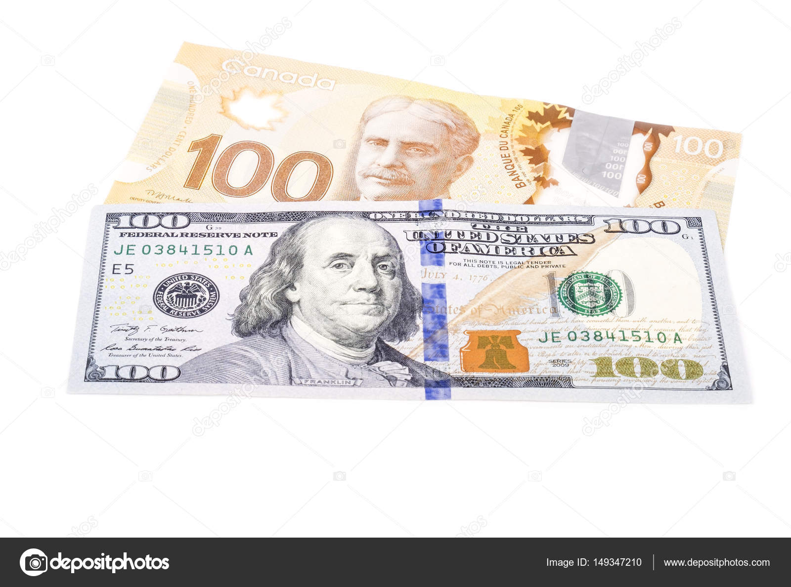 One Hundred US Dollar Bill Verses 100 Canadian Dollar Bill Stock Photo chiyacat 149347210