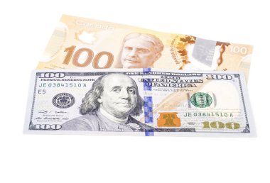 One Hundred US Dollar Bill Verses 100 Canadian Dollar Bill clipart
