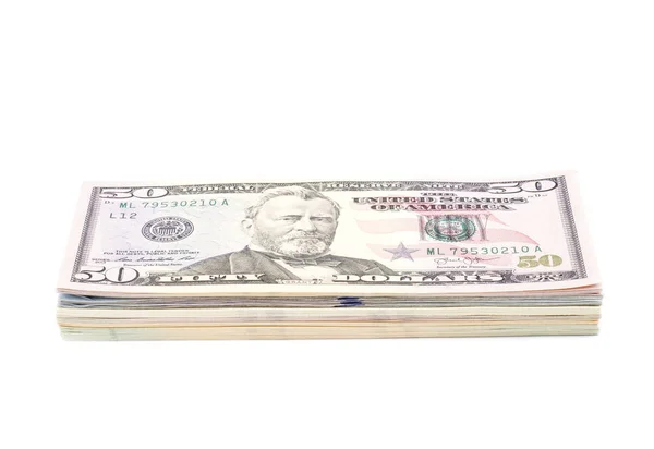 Pila de billetes de dólar estadounidense con billete de 50 dólares en la parte superior — Foto de Stock