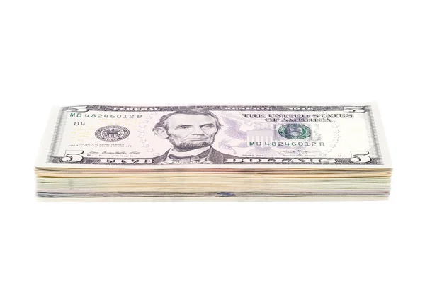 Stapel von uns Dollarscheinen mit 5-Dollar-Schein obendrauf — Stockfoto
