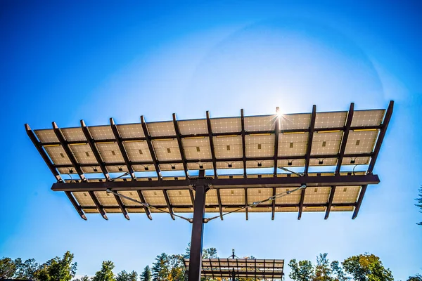 Solar panel with sun and blue sky — Stock Photo, Image