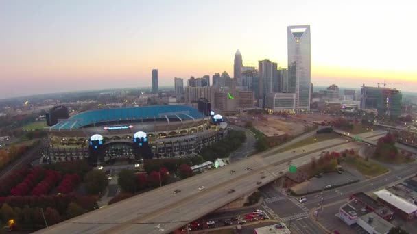 Stadium and Charlotte city skyline — Stock Video