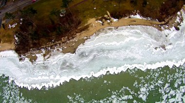 grand traverse bay in state of michigan froszen in march clipart